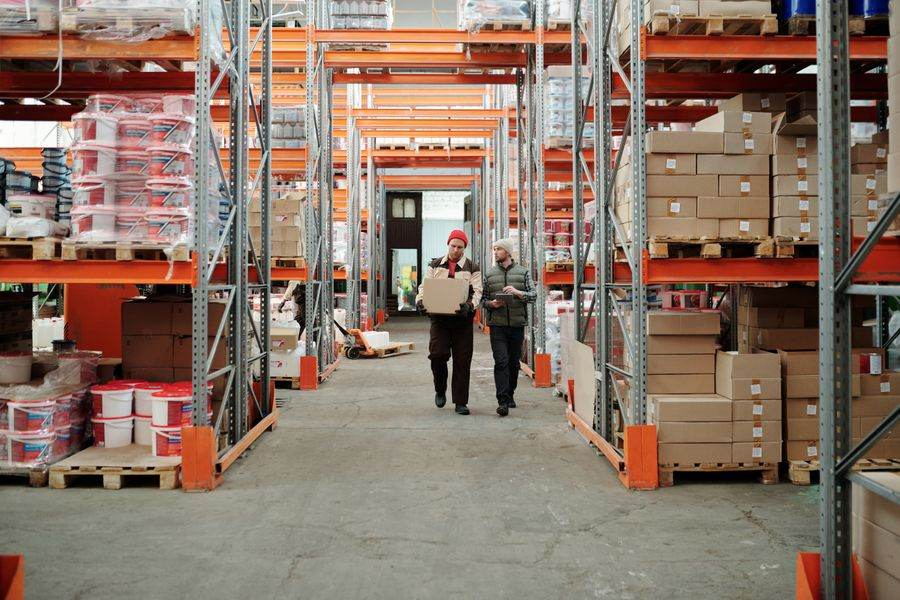 Warehouse aisle with racked inventory